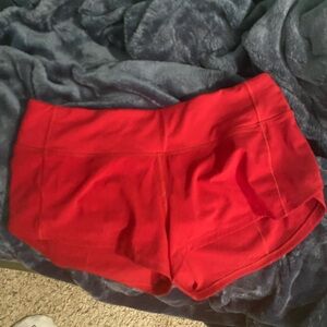 Lululemon Red speed ups: size 4, low rise, 2.5 inseam